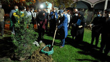 Planting saplings in the Park Shahr in memory of the late Saadi Afshar an Iranian traditional theatre veteran